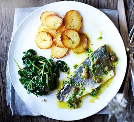 Baked sea bass with lemon caper dressing