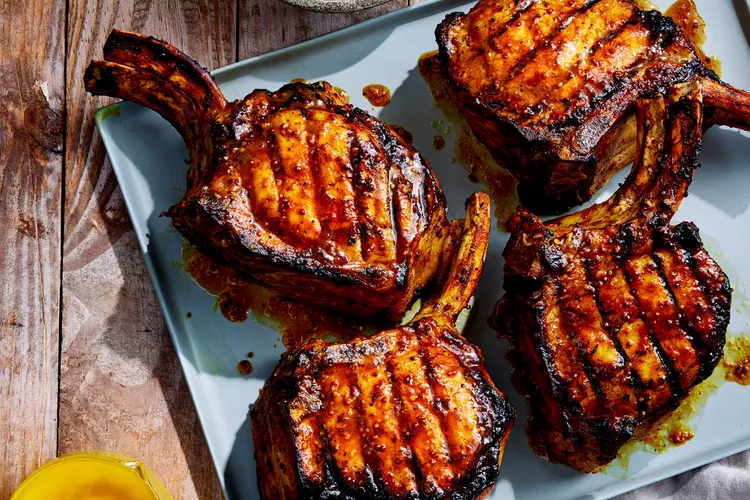 Pork Chops With Carolina Barbecue Sauce, Smoked Butter, And Braised Onions